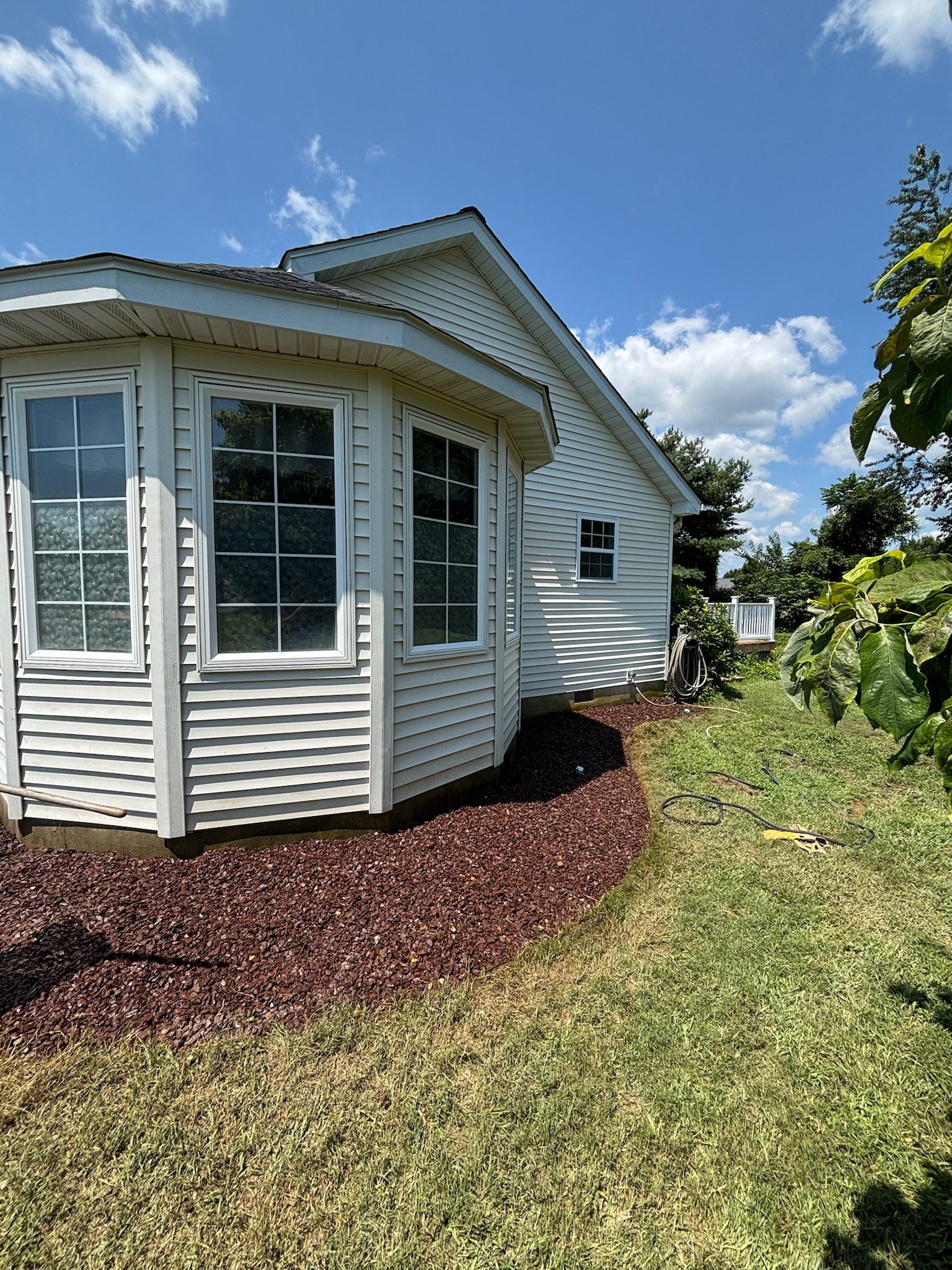 Clean home exterior after service by 302 Bin Bros