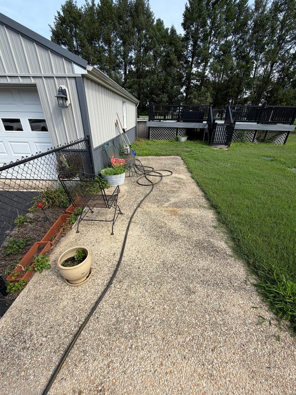 Exposed aggregate patio before power washing in Milford Delaware