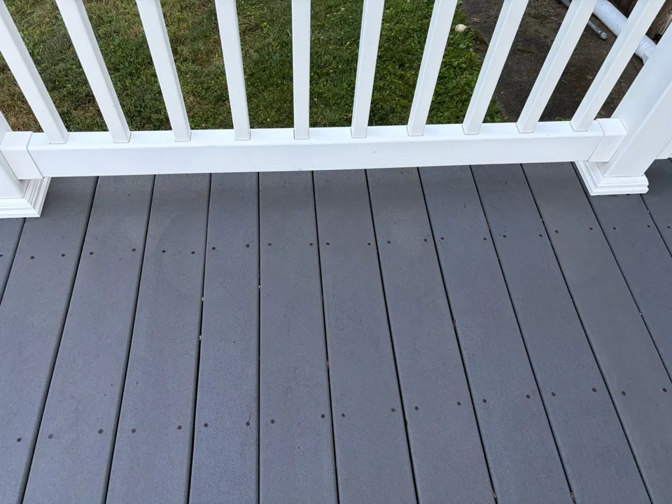 Composite deck boards after power washing