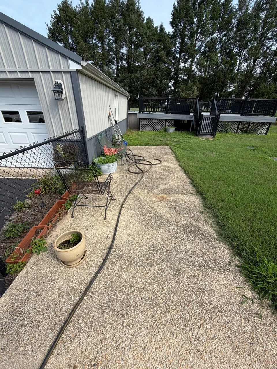 Exposed aggregate patio before power washing